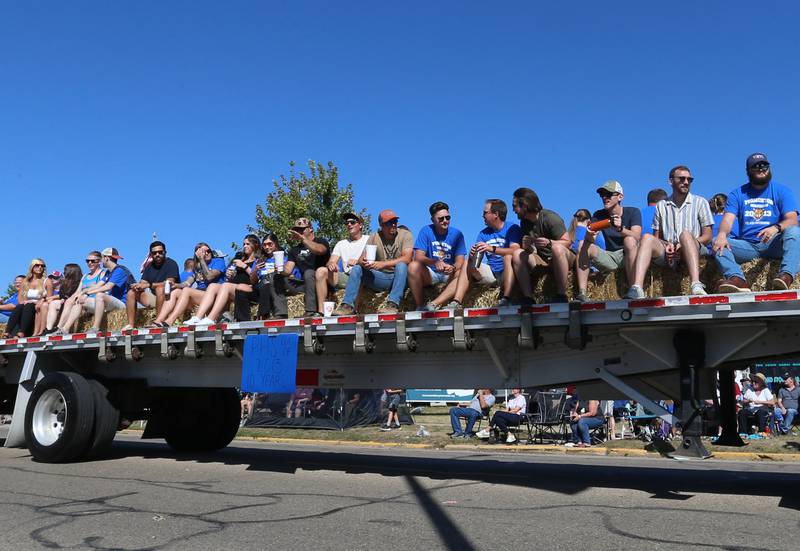 The Princeton High School class of 2013 rides on a float during the 52nd annual Homestead Festival parade on Saturday, Sept. 9, 2023 in Princeton.