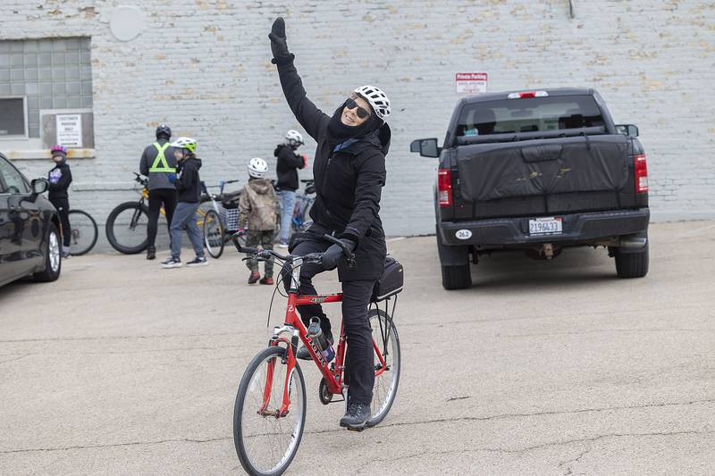 Deb Mellen waves as she heads off Wednesday, Jan. 1, 2025, for the annual New Year's Day ride.