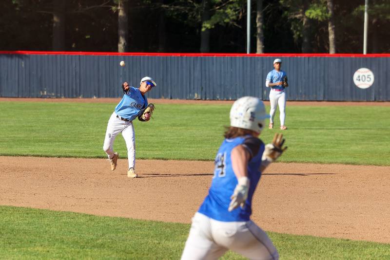 Kankakee's Elijah Santoyo throws to first base during the Kays' 8-4 loss to Clifton Central on Monday, May 11, 2026.