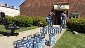 Local boy’s birthday tuna drive brings in record haul for Marseilles pantry