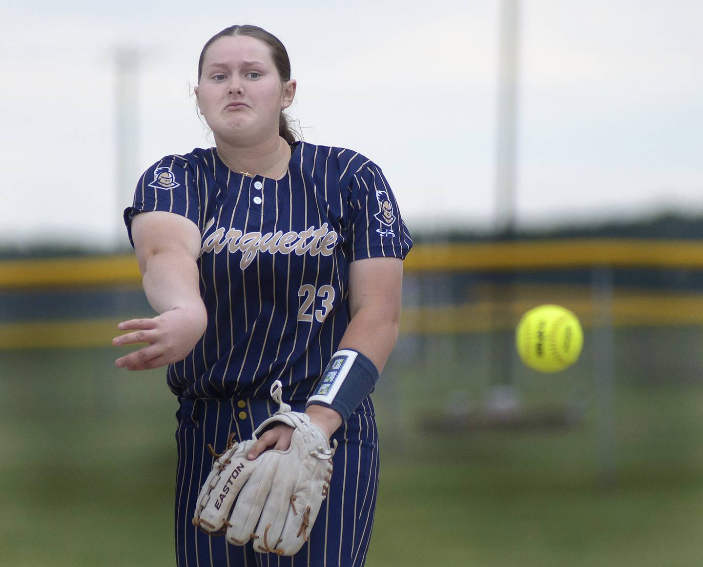 Marquette’s starting pitcher Taylor Cuchra lets go with a pitch against Elgin St Edward Wednesday at Serena.
