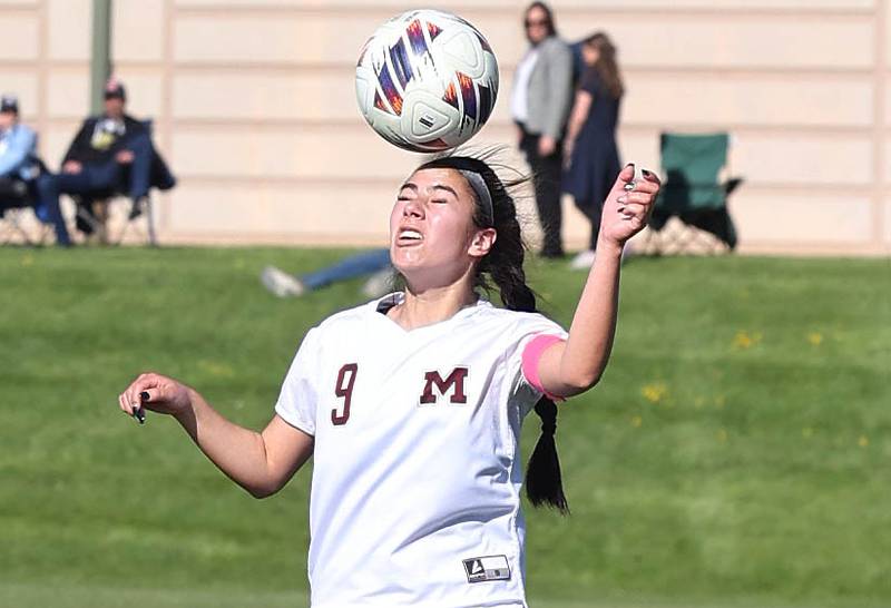 Morris' Kendra Vasquez heads the ball during their Interstate 8 Conference Tournament semifinal game Wednesday, May 3, 2023, at Sycamore High School.