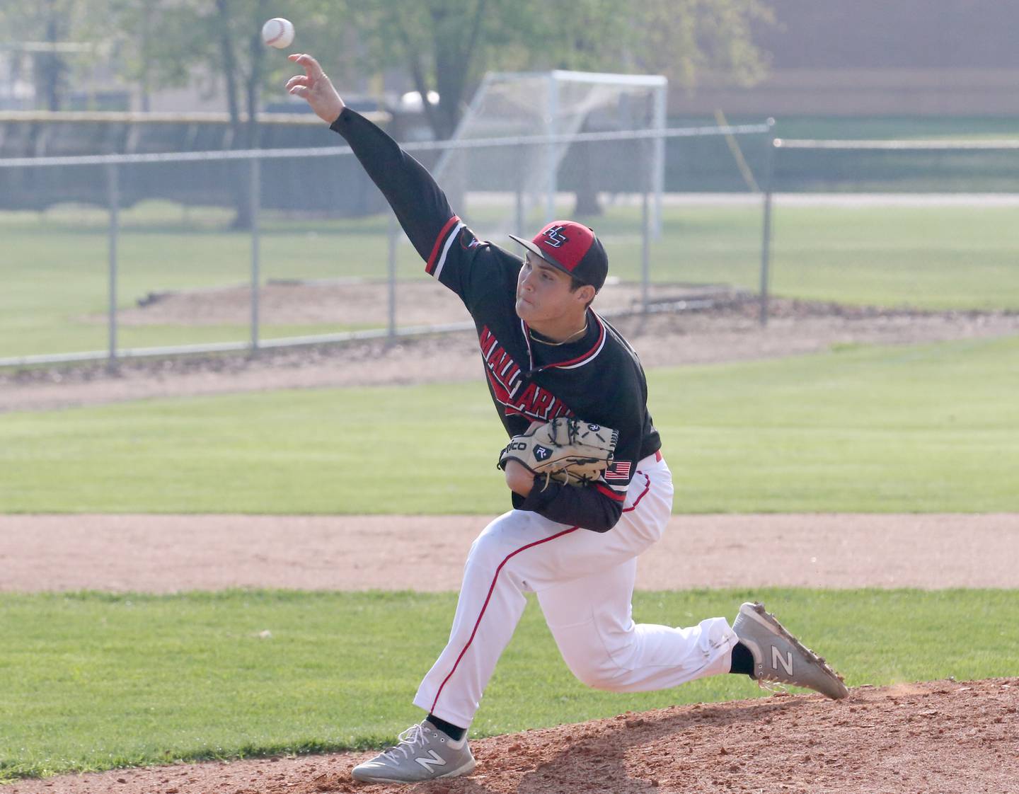 Henry's Lance Kiesewetter delivers a pitch to Putnam County on Tuesday, April 25, 2023 at Putnam County High School.