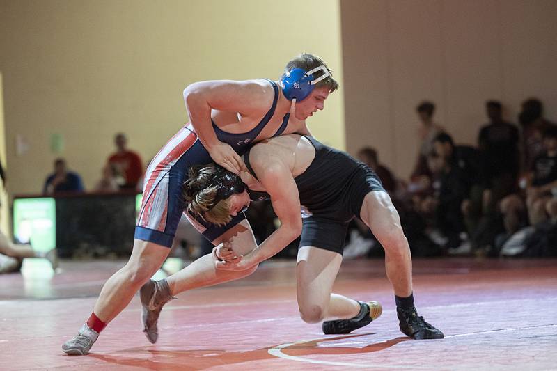 Dixon’s Blake Dingley Morrison’s Ethan Bush in the 175 pound weight class in the Class 1A wrestling sectionals at Oregon.