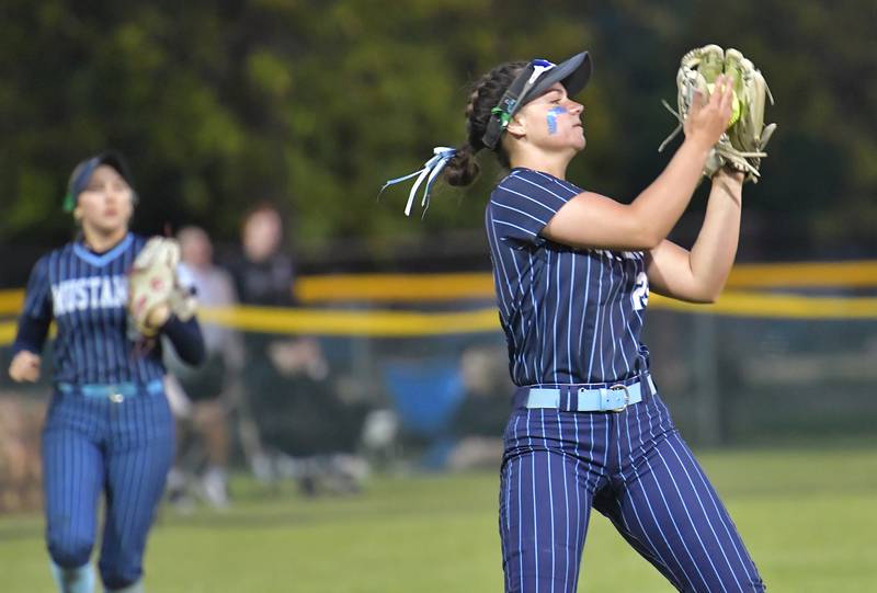 Downers Grove South’s Jacklyn Meyers makes a putout in left field during a game against Downers Grove North on May 14, 2026 at McCollum Park in Downers Grove.