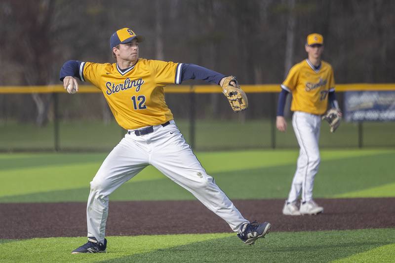 Sterling’s Drew Nettleton throws to first for an out against Moline Wednesday, April 16, 2025.