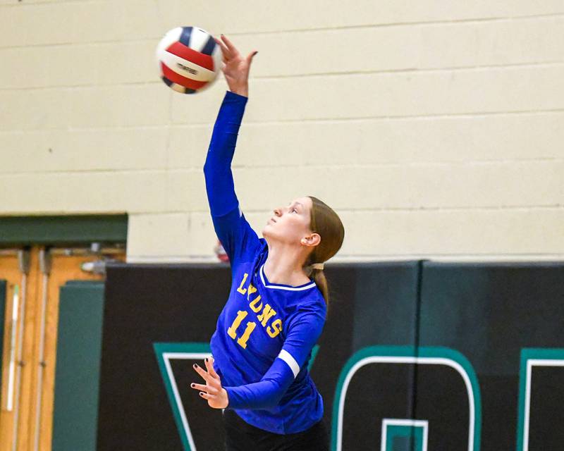Lyons Township's Kate Potter (11) serves the ball during the regional title game while taking on York on Thursday Oct. 30, 2025, held at York High School.