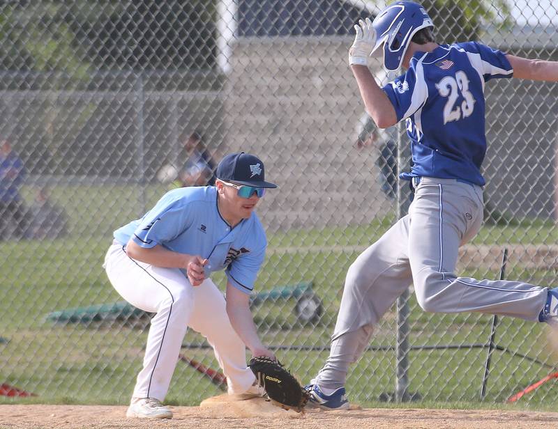 Bureau Valley's Brock Rediger makes a catch at first base to force out Princeton's Noah LaPorte on Thursday, April 25, 2024 at Bureau Valley High School.