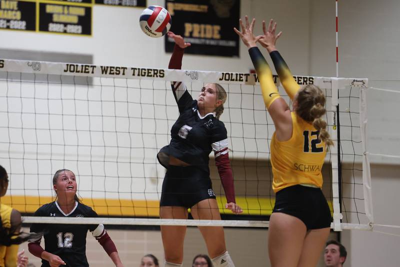 Plainfield North’s Elizabeth Fitzgerald stretches for a shot against Joliet West on Wednesday, Sept. 6, 2023 in Joliet.