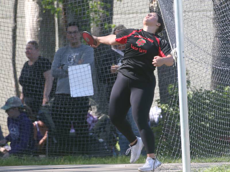 L-P's Cassidy Cromwell throws discus during the Interstate 8 Conference girls track championship on Friday, May 9, 2025 at Morris High School.