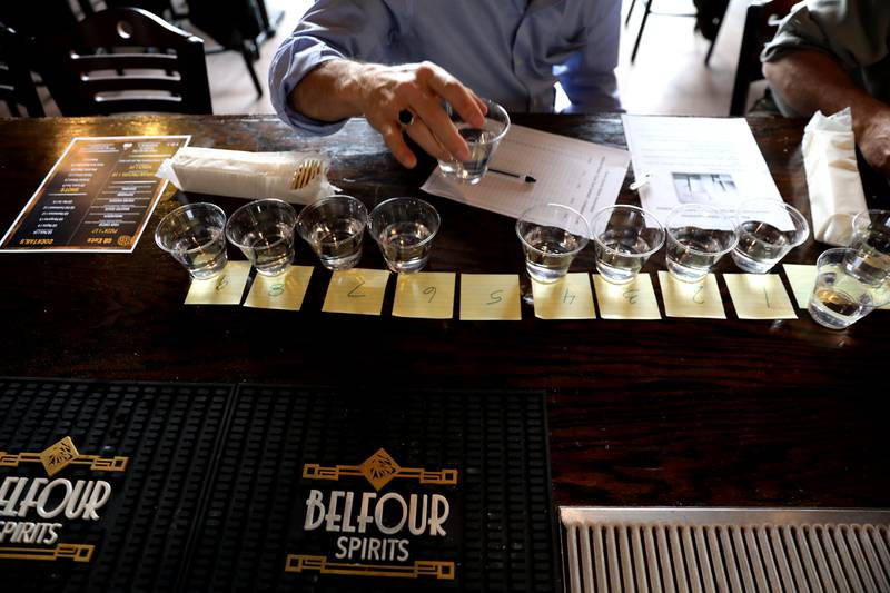 Water samples lined up for judging in the annual Kane County Water Association's annual water-tasting contest at Global Brew in St. Charles on Thursday, Dec. 21, 2023.
