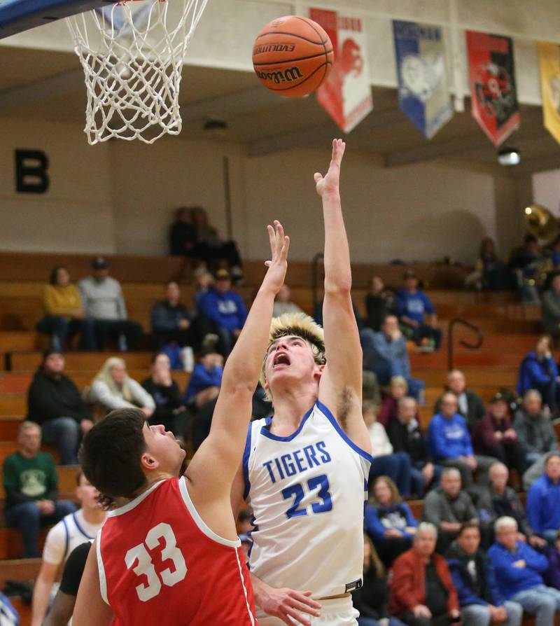 Princeton's Noah LaPorte shoots a shot over Ottawa's Cooper Knoll on Monday, Feb. 5, 2024 at Prouty Gym.