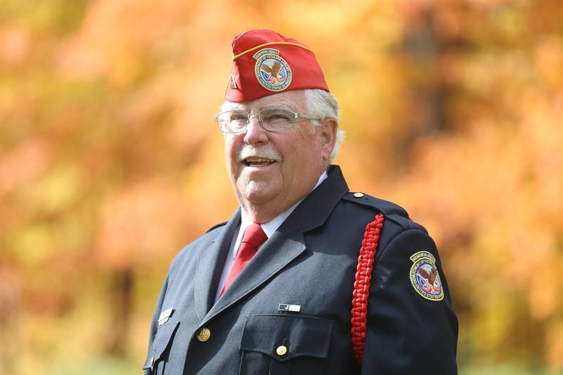 Fred Siegel, of the Memorial Squad, poses for a photo at the Abraham Lincoln National Cemetery on Monday, Oct. 23, in Elwood.