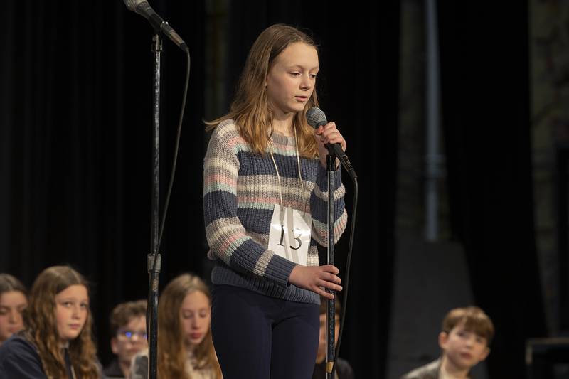 Oregon sixth grader Lucia Wells competes Thursday, Feb. 21, 2024 at the Lee-Ogle-Whiteside regional spelling bee. Wells missed on the word “statistician” in round five.