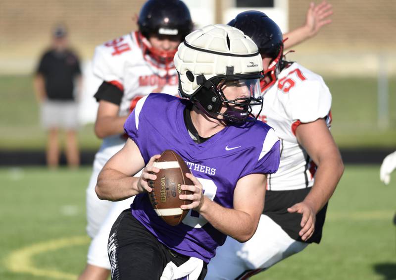 Manteno's Connor Harrod looks to pass in a scrimmage game against Momence on Friday, August 22, 2025.