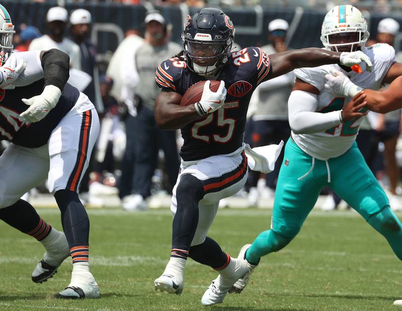 Chicago Bears running back Kyle Monangai finds some room to run in the Miami Dolphins defense Sunday, Aug. 10, 2025, during their preseason game at Soldier Field in Chicago.