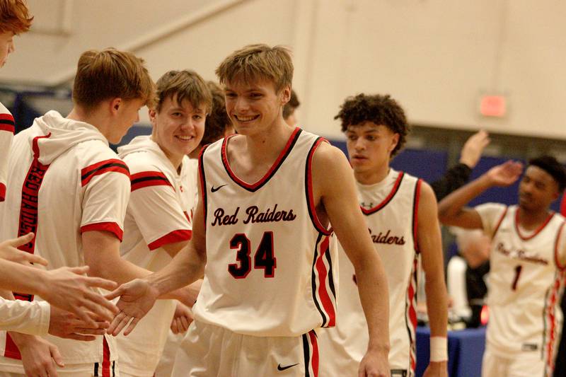 Huntley’s Carter Schaap (34) returns to the bench during a game against Crystal Lake Central in tournament basketball action at Johnsburg High School Monday evening.