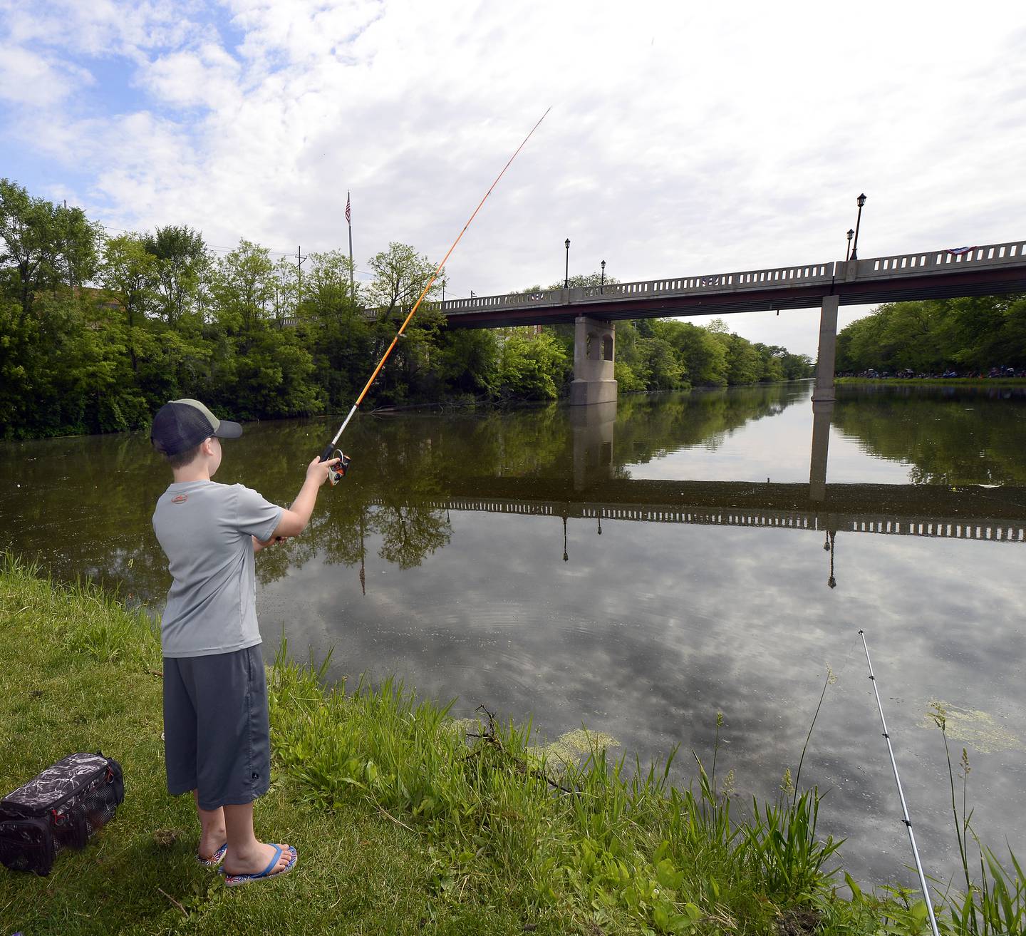 Landon Gleason finds a picturesque spot to try his luck Saturday, June 4, 2022, during the Kids Fishing Tournament at Lock 14 in La Salle.