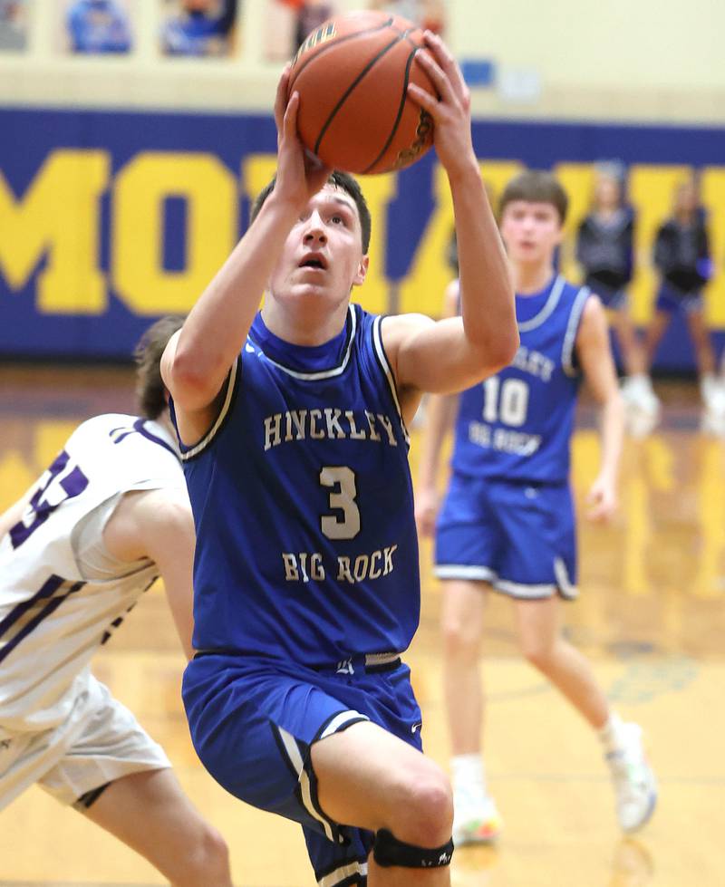 Hinckley-Big Rock's Ben Hintzsche gets to the basket ahead of the Serena defense Friday, Feb. 3, 2023, during the championship game of the Little 10 Conference Basketball Tournament at Somonauk High School.