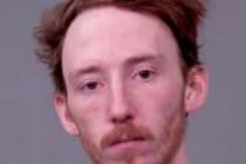 Shorewood man charged with illegal gun possession