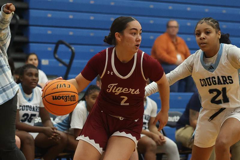 Plainfield North’s Kaitlyn Sedillo looks for a play against Plainfield South on Thursday, Jan 9, 2025.