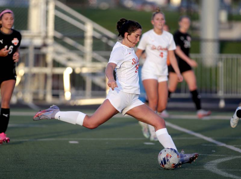 St. Charles East’s Tia Bernstein kicks the ball during a game at Wheaton Warrenville South on Tuesday, April 18, 2023.