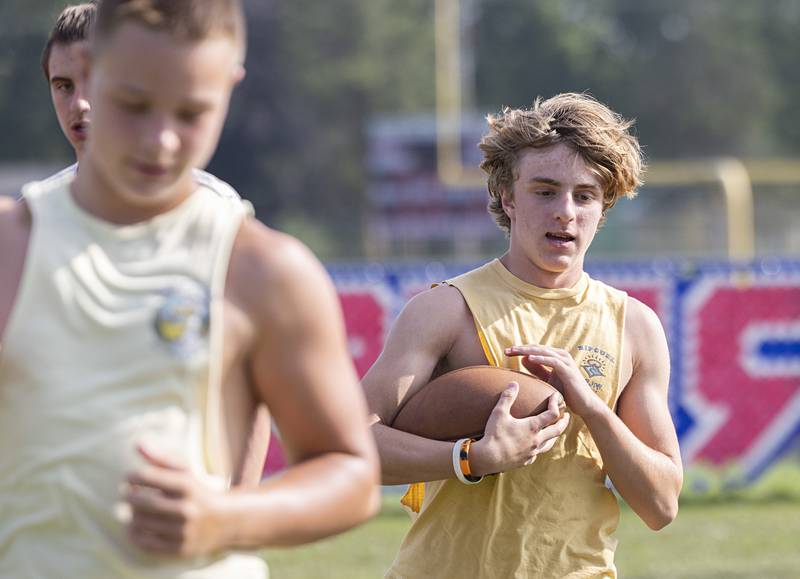 The Morrison football team goes through workouts during a camp Tuesday, July 25, 2023. The Mustangs will open their season against Mendota at the end of August.