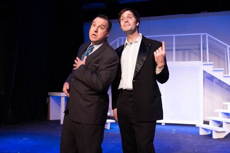 “Frank Abagnale Sr.” (Played by Dave Roden) leans on “Frank Abagnale Jr.” (Played by Payton Drake) in song on Monday, March 24, 2025 at River Valley Players Theatre in Henry.
