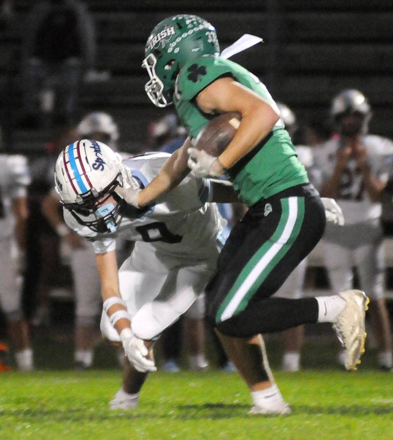 Seneca senior Cam Shriey pushes away SJO's Lane McKinney for the first touchdown of their matchup Friday, Oct. 17, 2025 at Seneca High School.