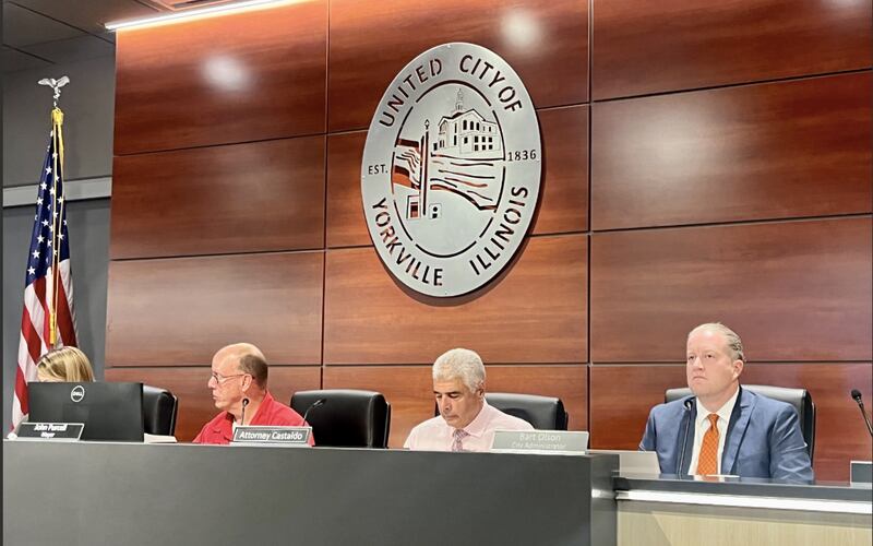 Yorkville Mayor John Purcell (far left) and City Administrator Bart Olson (far right) speak at the Aug. 13 City Council Meeting.