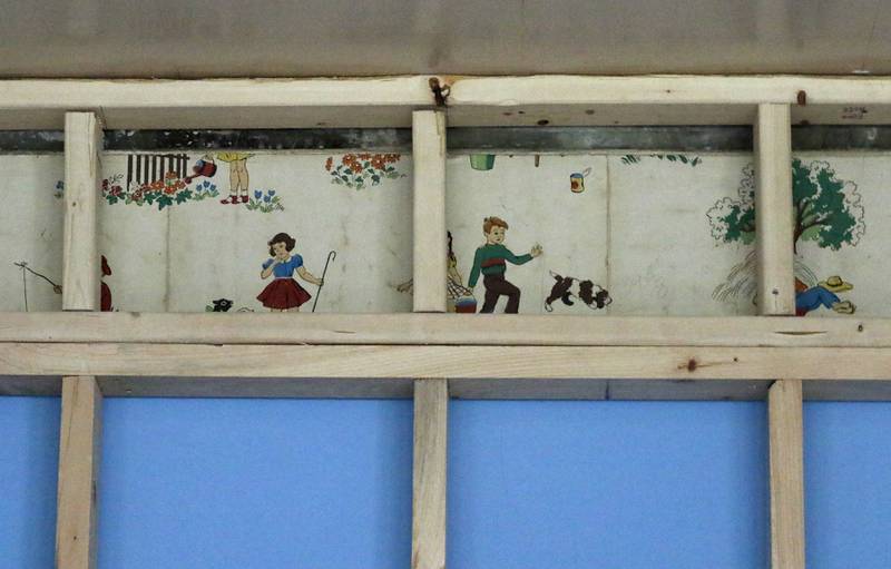 The original wall paper in the  former Ridgefield schoolhouse at 8617 Ridgefield Road, near Crystal Lake, on Wednesday, May 21, 2025. Brent Hollenberg plans to turn the schoolhouse into a six-unit Airbnb. The building was last the home of the McHenry County Jewish Congregation.