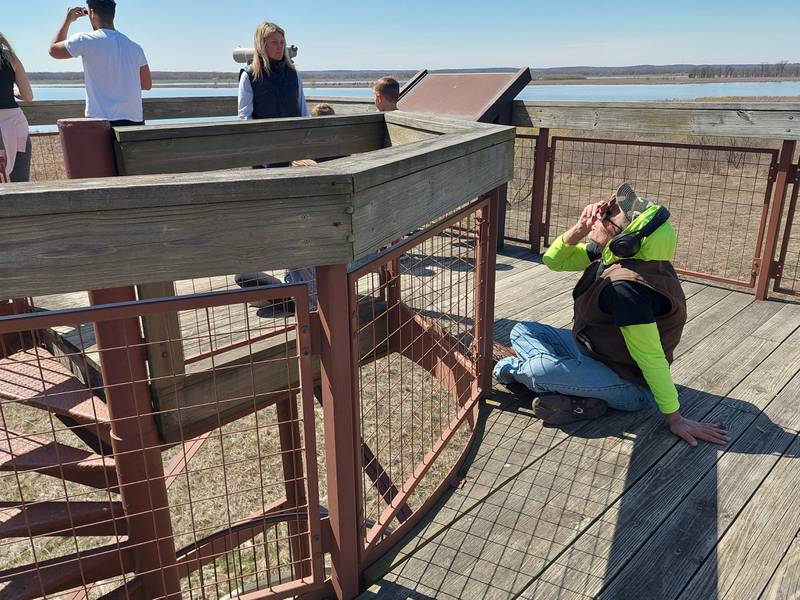 Residents viewed the partial solar eclipse Monday, April 8, 2024, from the top of the tower at the Dixon Waterfowl Refuge outside of Hennepin.