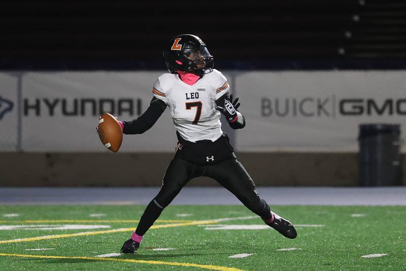 Leo’s Marshawn Durr looks to pass against Joliet Catholic on Friday, Oct. 6, 2023 in Joliet.
