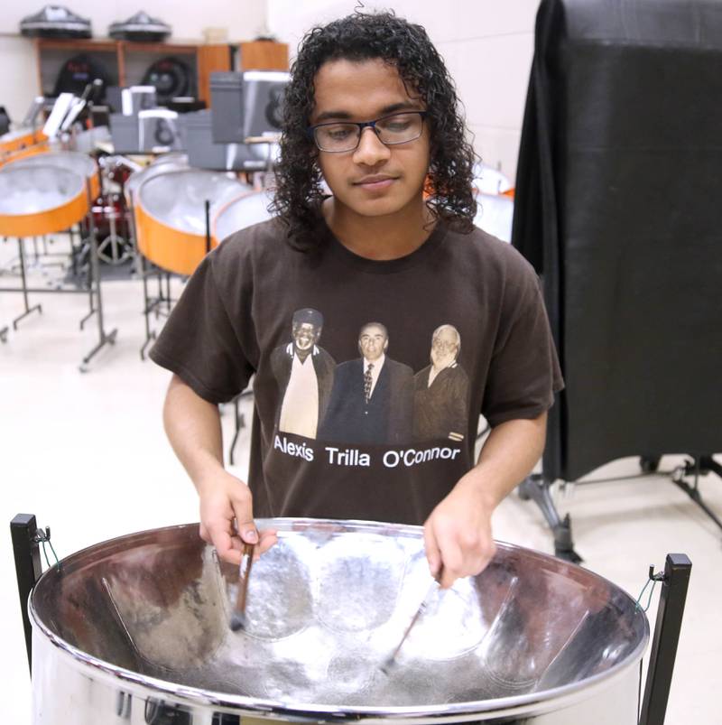 Jaden Teague-Núñez, 16, a sophomore at DeKalb High School, with the steelpan Monday, March 18, 2024, in the band room at the school. Teague-Núñez won first place in the Chicago Symphony Orchestra’s Young Artists Competition and will appear as a soloist in a CSO youth concert during the 2024-25 season.