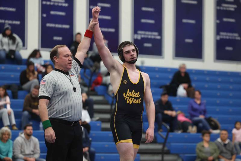 Joliet West’s Jacob Tyderek defeats Plainfield South’s Jamal Jones Jr. in the 215-pound match on Wednesday, Dec. 11, 2024 in Plainfield.