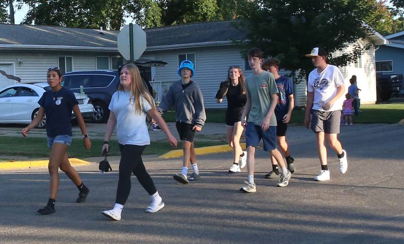 Putnam County High School Student Council members walk during the inaugural Homecoming parade on Wednesday, Sept. 17, 2025 down Elm Street in Granville.