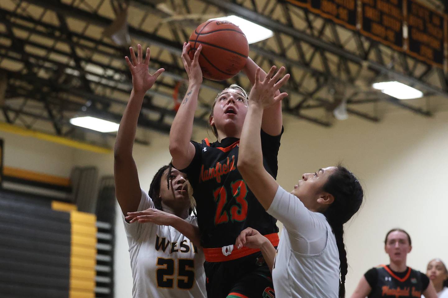 Plainfield East’s Lexi Sepulveda takes a contested shot against Joliet on Tuesday, Feb. 6th 2024 in Joliet.