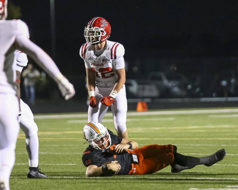 Yorkville's Dillon Viscogliosi (12) sacks Plainfield East's Brady Cloherty (12) during football game between Yorkville at Plainfield East Friday, Sept 19, 2025 in Plainfield.