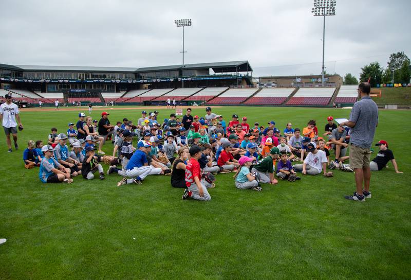 Kids reflect on their day at the Kane County Cougar's Youth Clinic at Northwestern Medicine Field on Saturday, July 16, 2022.