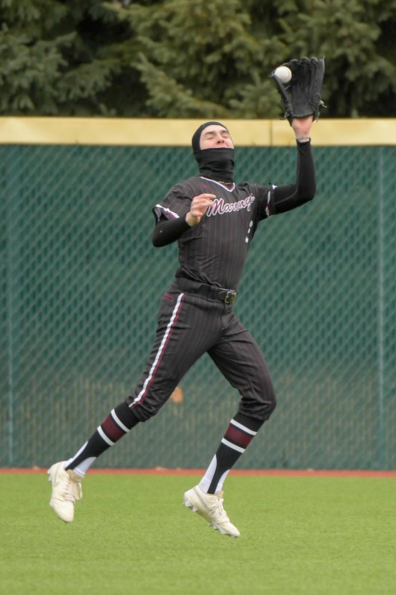 Marengo's David Lopez (3) makes a catch for the out against Streamwood during a game on Monday, March 25, 2024 in Carol Stream.