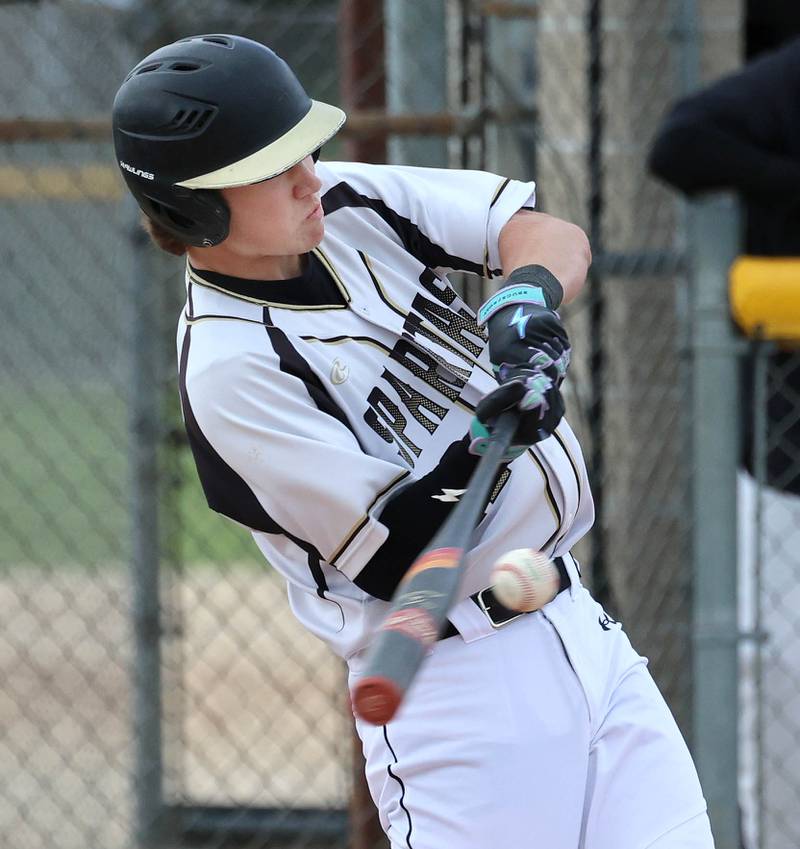 Sycamore's Chace Kuhns makes contact Wednesday, May 13, 2026, during their game against Morris at the Sycamore Community Sports Complex.