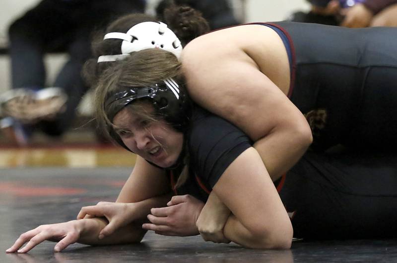 Huntley’s Brianna Felde tries to get out of the grasp of Morris’ Morgan Congo in the 190-pound match of a nononference wrestling meet on Wednesday, Jan. 22, 2025, at Huntley High School.