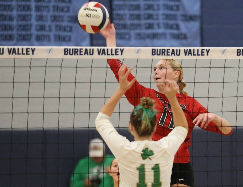 Erie-Prophetstown's Lauren Abbott sends a kill past Seneca's Franki Meyers in the Class 2A Sectional semifinal game on Tuesday, Nov. 5, 2024 at Bureau Valley High School.