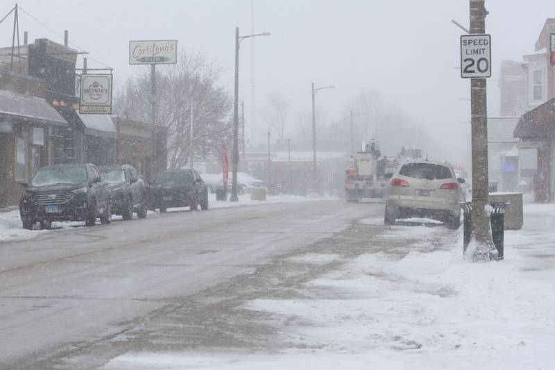 Snow falls along East Walnut Street on Monday, March 16, 2026 in Oglesby.