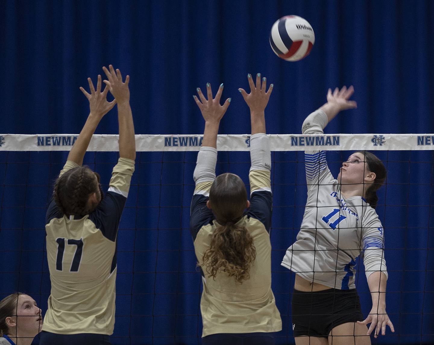 Newman’s Isabelle Lanning goes up for a hit against Mercer County Wednesday, Sept. 24, 2025.