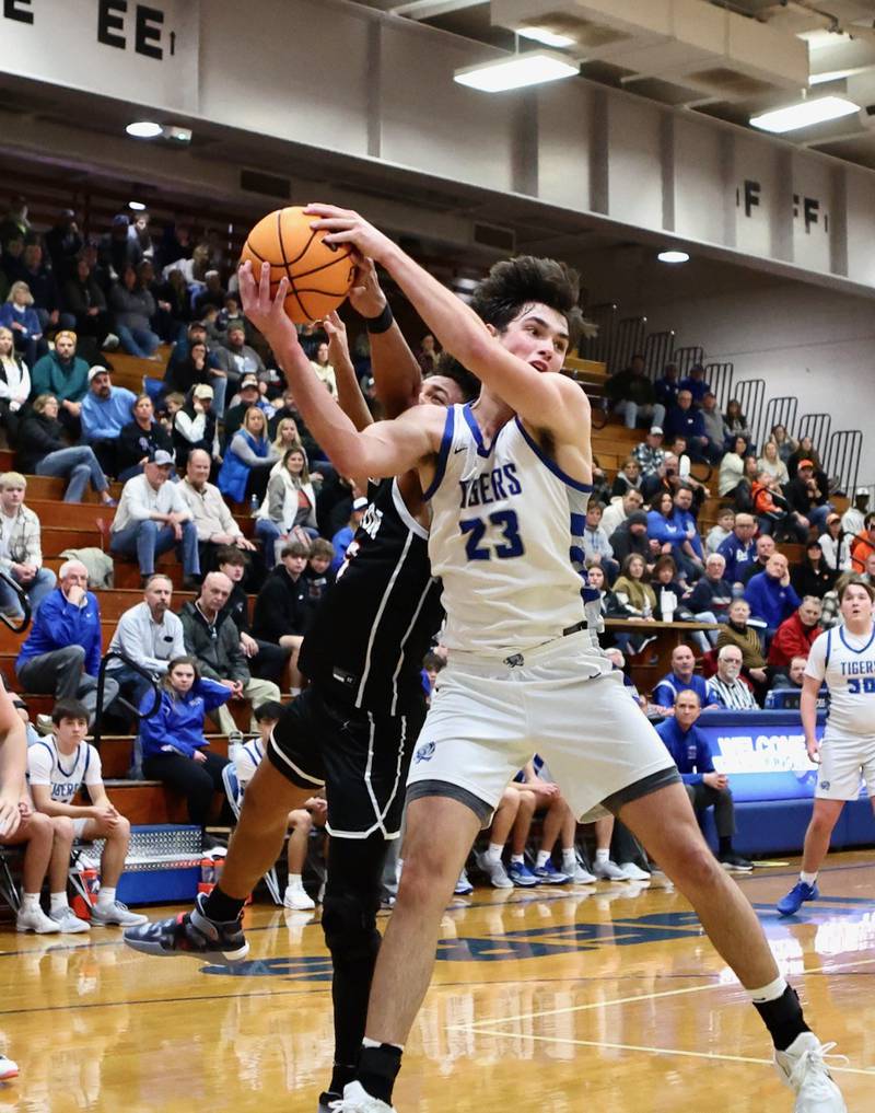 Princeton's Noah LaPorte pulls down a rebound against Byron Saturday night at Prouty Gym.