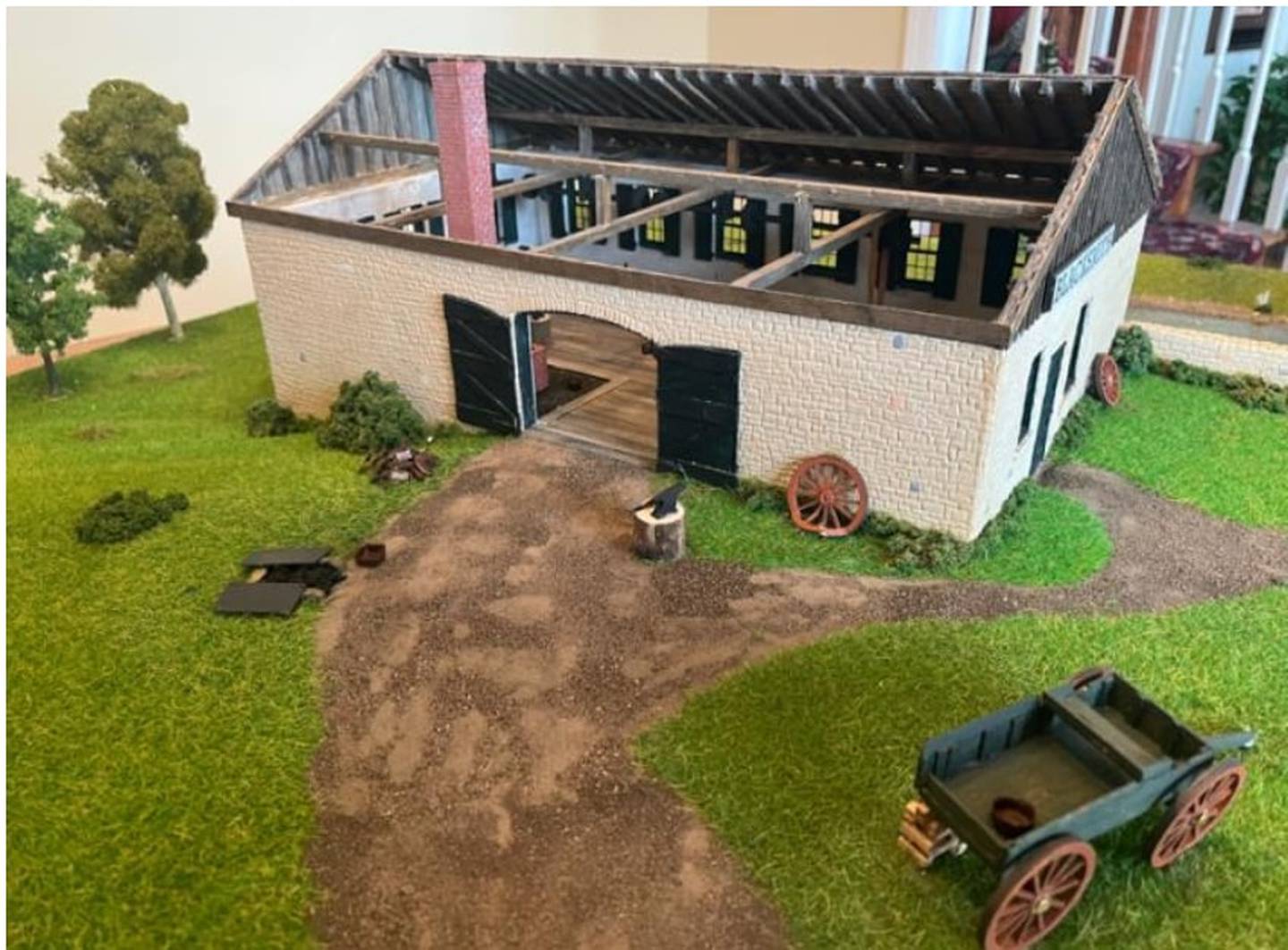 Craig Elliott's architectural model of the northeast corner of the 1840s blacksmith shop with interior exposed.