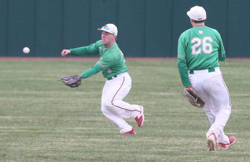 L-P center fielder Brady Romagnoli chases down a ground ball as teammate Brandon Foreman on Wednesday, April 17, 2024 at Huby Sarver Field inside the L-P Athletic Complex in La Salle.