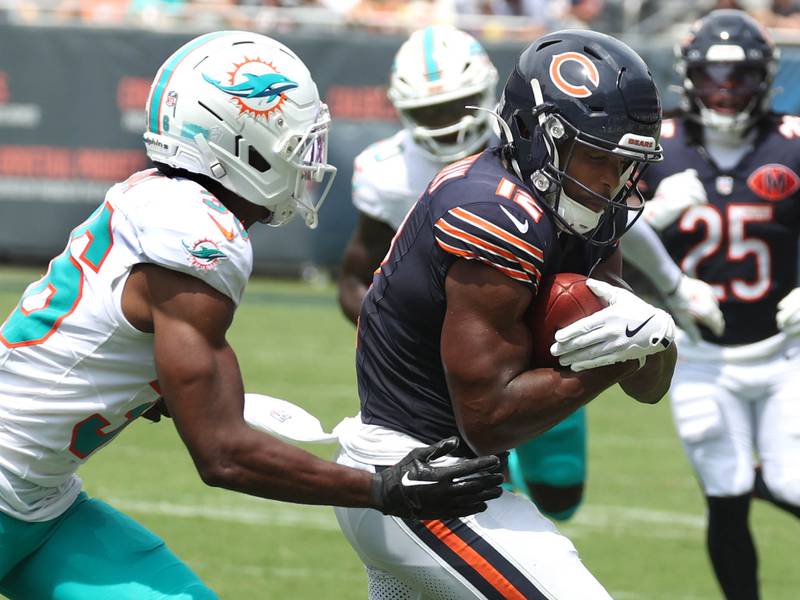 Chicago Bears wide receiver Devin Duvernay makes a catch in front of Miami Dolphins cornerback Storm Duck Sunday, Aug. 10, 2025, during their preseason game at Soldier Field in Chicago.