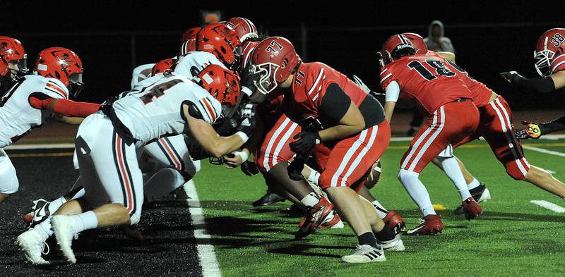 Yorkville quarterback Jack Beetham fumbles on a goal line play against Bolingbrook on Friday, Sept. 27, 2024, during a varsity game at Yorkville High School.